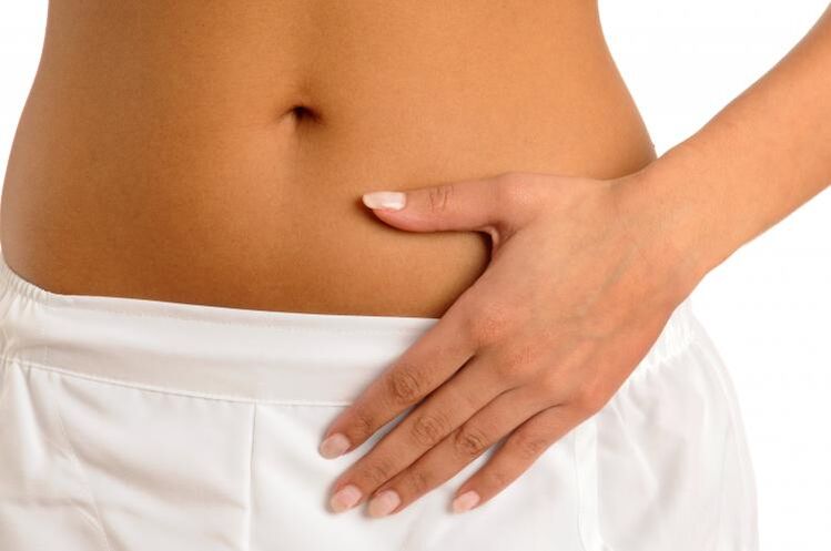 Schmerzen im Unterleib als Symptom einer Blasenentzündung bei Frauen